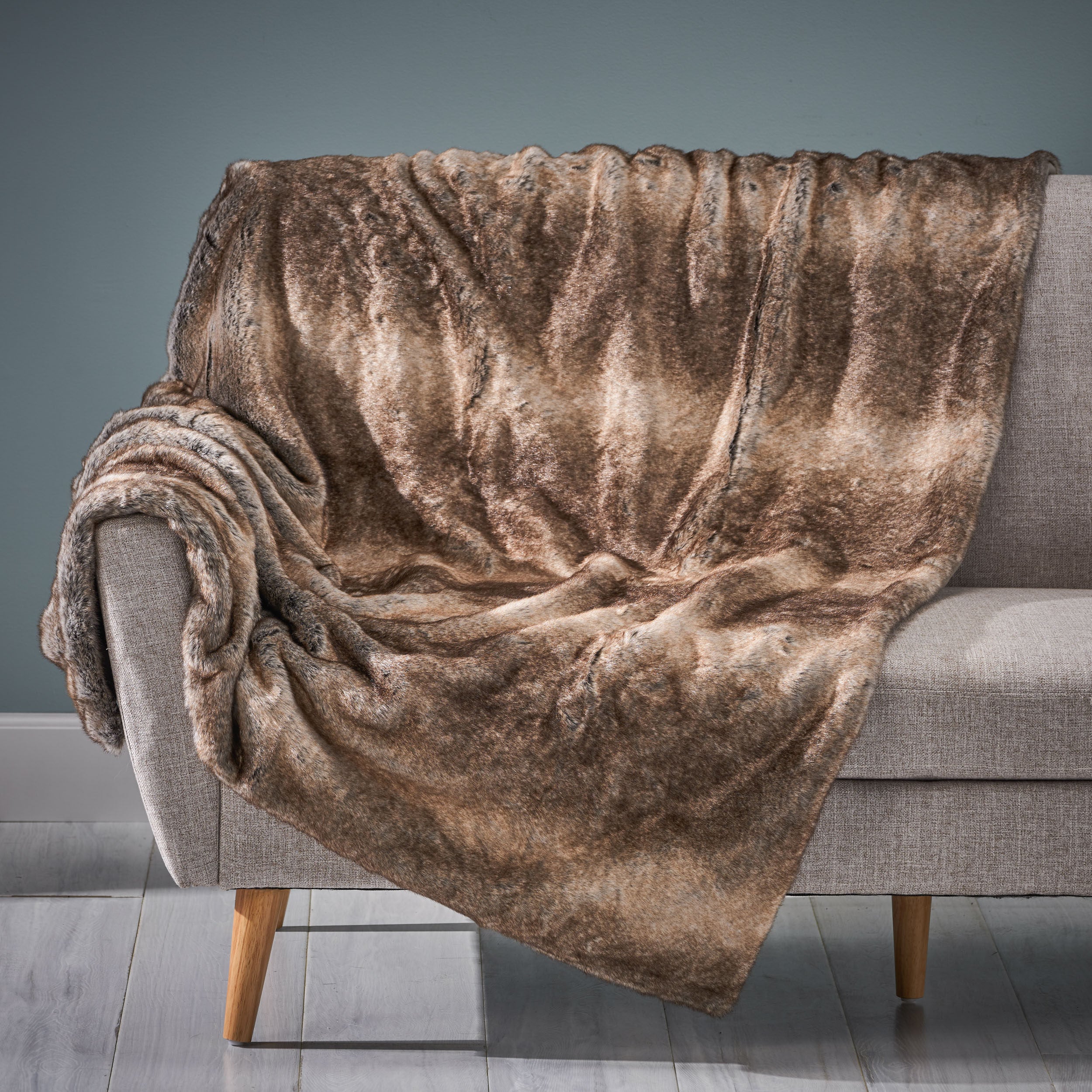 Luxury faux fur blanket in brown, 50 inches X 60 inches, adding texture to home decor